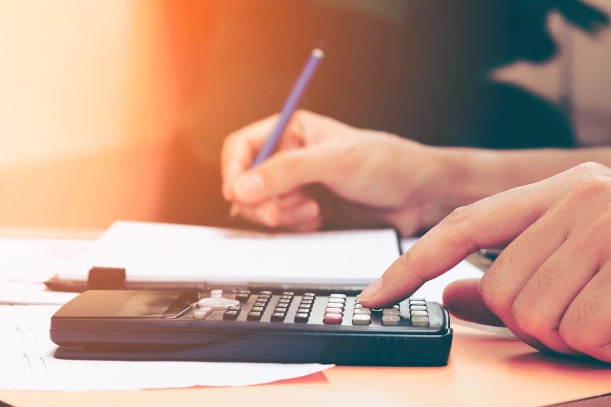 A person using a calculator to do their work.